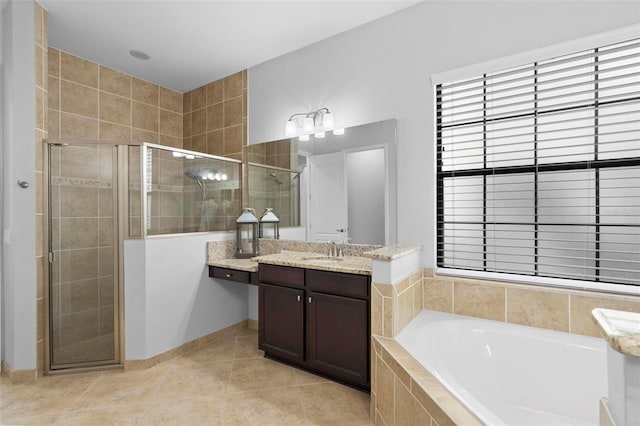8312 Prestbury Dr, Orlando, FL 32832 - bathroom featuring a stall shower, tile patterned flooring, a garden tub, and vanity