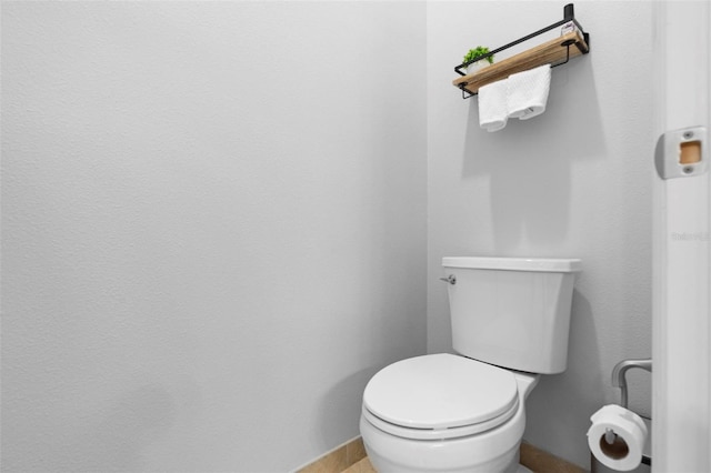 8312 Prestbury Dr, Orlando, FL 32832 - bathroom with baseboards and toilet