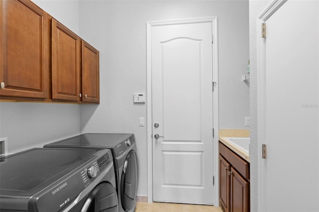 8312 Prestbury Dr, Orlando, FL 32832 - laundry area featuring washer and dryer and cabinet space