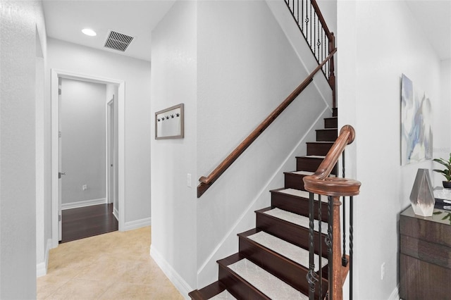 8312 Prestbury Dr, Orlando, FL 32832 - staircase featuring recessed lighting, baseboards, and tile patterned flooring