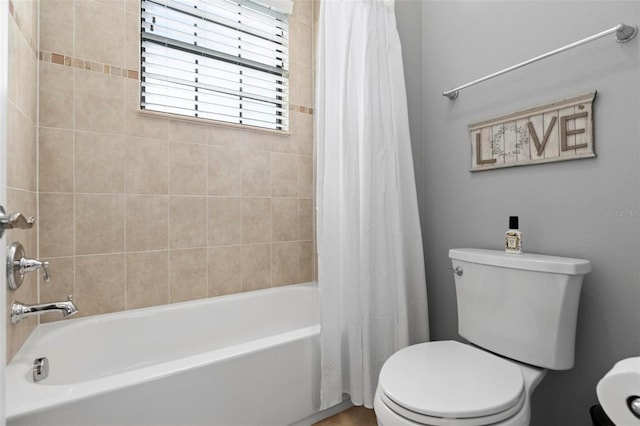 8312 Prestbury Dr, Orlando, FL 32832 - bathroom featuring toilet and shower / tub combo