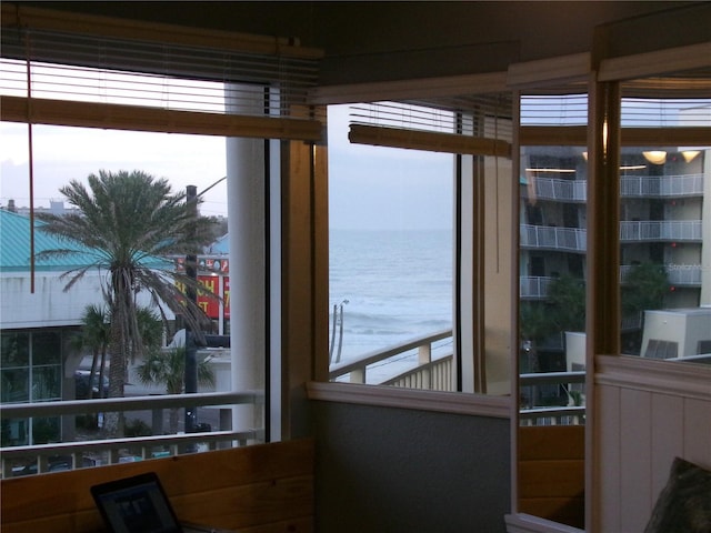 219 S Atlantic Ave Unit 436, Daytona Beach, FL 32118 - sunroom featuring a water view and healthy amount of natural light