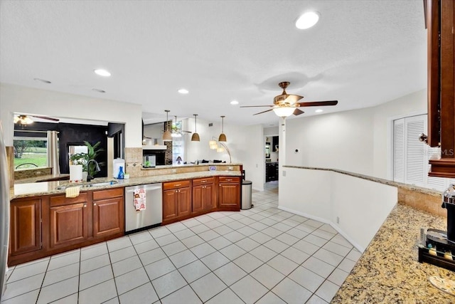 2900 Hammock Dr, Plant City, FL 33566 - kitchen featuring dishwasher, a ceiling fan, open floor plan, recessed lighting, and light stone countertops