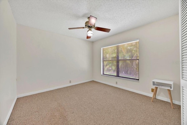 2900 Hammock Dr, Plant City, FL 33566 - unfurnished room featuring light carpet, ceiling fan, and a textured ceiling
