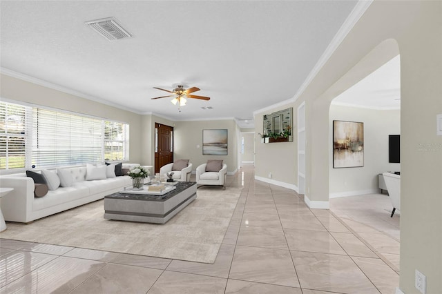 181 W Minnehaha Ave, Clermont, FL 34711 - living area featuring crown molding, a ceiling fan, and baseboards