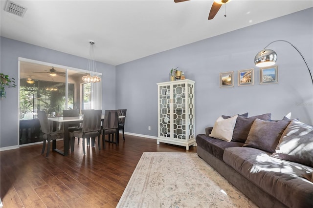 2762 Pepper Ln, Orlando, FL 32812 - living area featuring a ceiling fan, dark wood finished floors, and baseboards