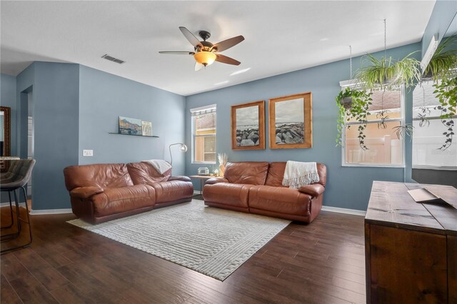 2762 Pepper Ln, Orlando, FL 32812 - living room with dark wood-type flooring, ceiling fan, and baseboards
