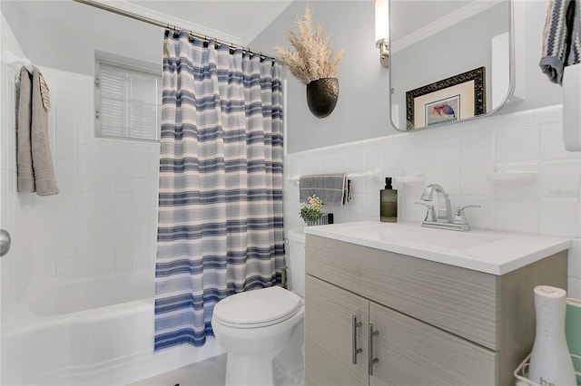 936 N Baker St, Mount Dora, FL 32757 - full bathroom with toilet, shower / bath combination with curtain, vanity, tile walls, and wainscoting