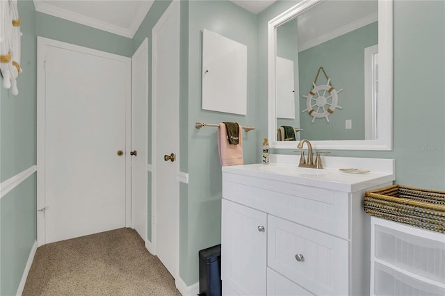 936 N Baker St, Mount Dora, FL 32757 - bathroom with ornamental molding, vanity, and baseboards