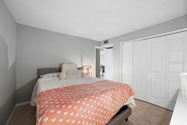 5800 N Banana River Blvd Unit 128, Cape Canaveral, FL 32920 - carpeted bedroom with a closet