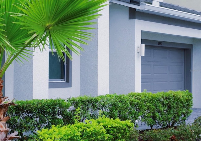 3880 Sonoma Blvd, Kissimmee, FL 34741 - view of home's exterior featuring stucco siding and a garage