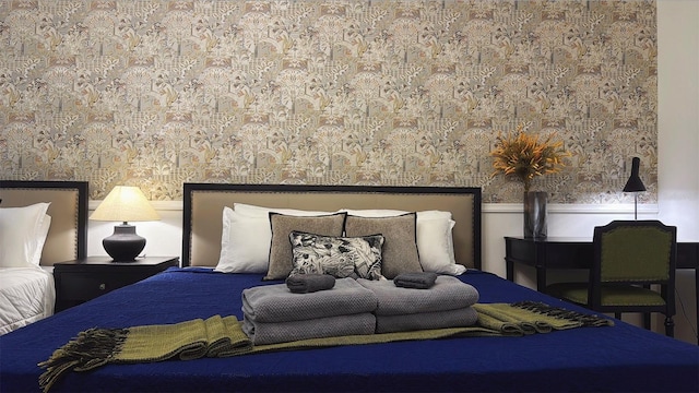 3880 Sonoma Blvd, Kissimmee, FL 34741 - bedroom featuring wallpapered walls and wainscoting