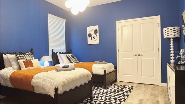 3880 Sonoma Blvd, Kissimmee, FL 34741 - bedroom with a closet and light wood finished floors