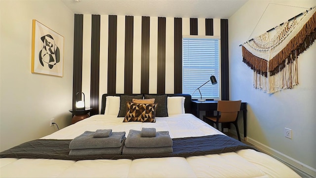 3880 Sonoma Blvd, Kissimmee, FL 34741 - bedroom with wallpapered walls and baseboards