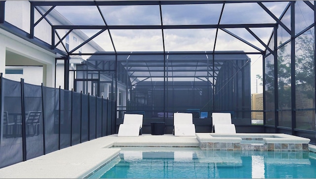 3880 Sonoma Blvd, Kissimmee, FL 34741 - view of swimming pool featuring a lanai, a pool with connected hot tub, and a patio