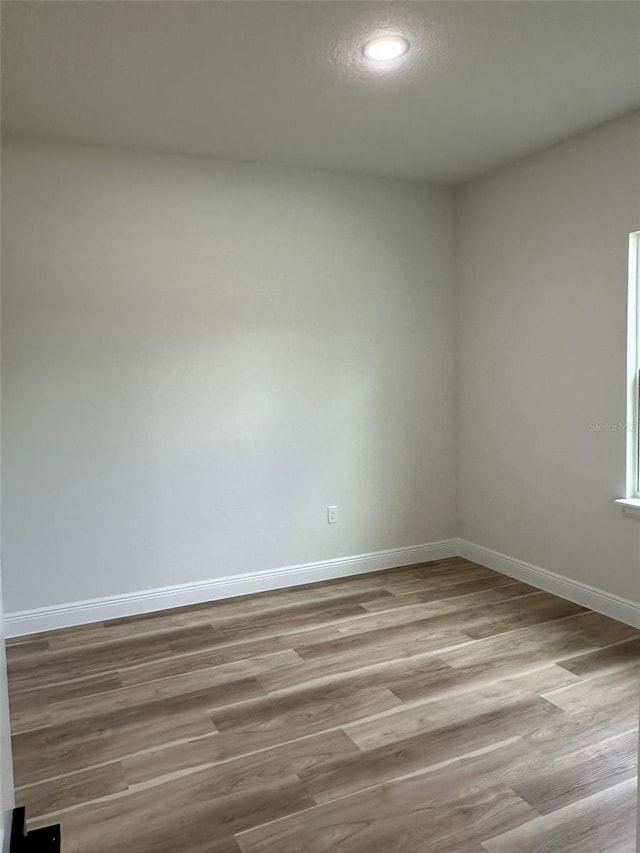 3063 SW 168th Loop, Ocala, FL 34473 - unfurnished room featuring baseboards, recessed lighting, and light wood-style flooring