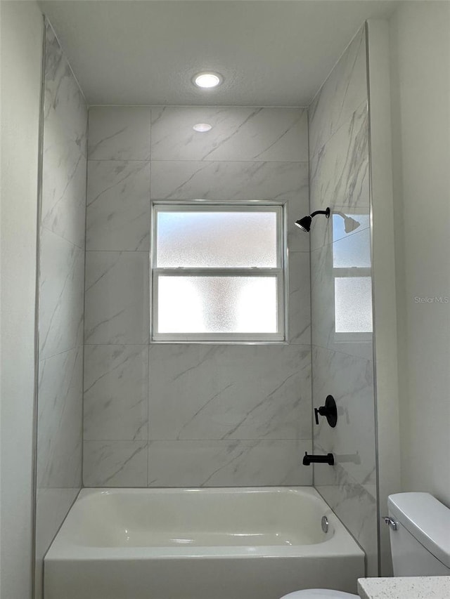 3063 SW 168th Loop, Ocala, FL 34473 - bathroom with toilet, shower / tub combination, and recessed lighting