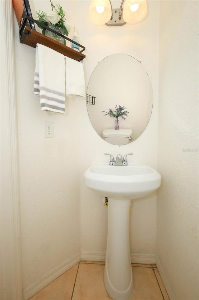 2493 Lancien Ct Unit 5, Orlando, FL 32826 - bathroom featuring tile patterned floors and baseboards