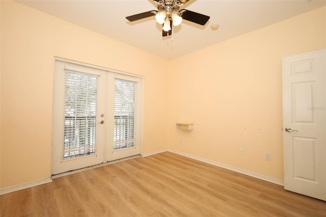 2493 Lancien Ct Unit 5, Orlando, FL 32826 - empty room with light wood-style flooring, ceiling fan, and french doors