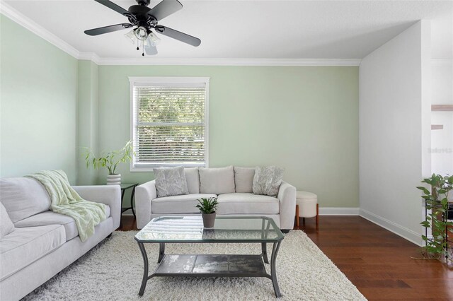 714 Home Grove Dr, Winter Garden, FL 34787 - living room with wood finished floors, baseboards, crown molding, and ceiling fan