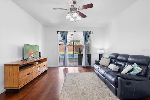 714 Home Grove Dr, Winter Garden, FL 34787 - living area featuring ceiling fan, dark wood-style flooring, and baseboards