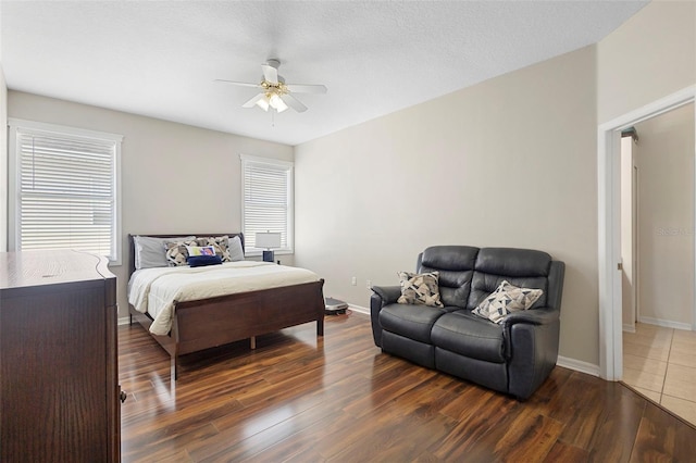 714 Home Grove Dr, Winter Garden, FL 34787 - bedroom featuring wood finished floors, baseboards, and a ceiling fan