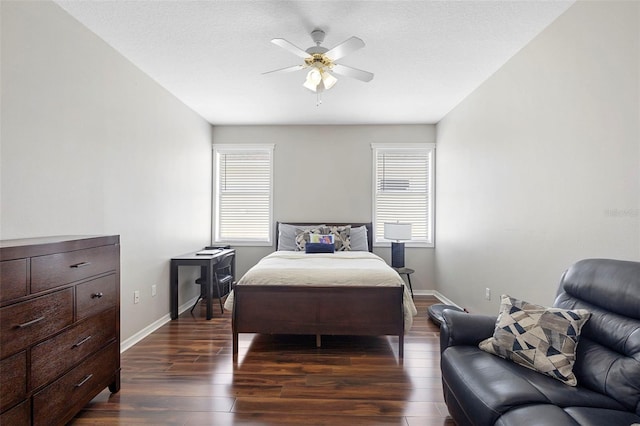 714 Home Grove Dr, Winter Garden, FL 34787 - bedroom with dark wood finished floors, baseboards, and ceiling fan
