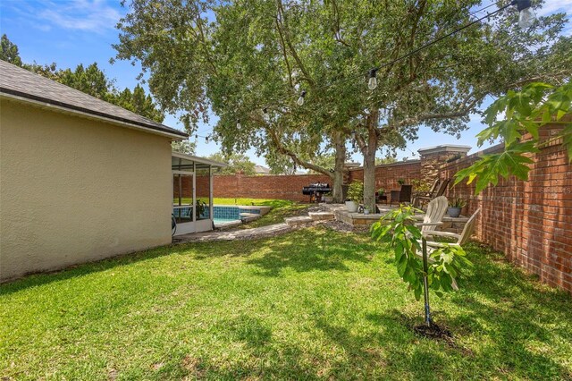 714 Home Grove Dr, Winter Garden, FL 34787 - view of yard featuring a sunroom and a patio area