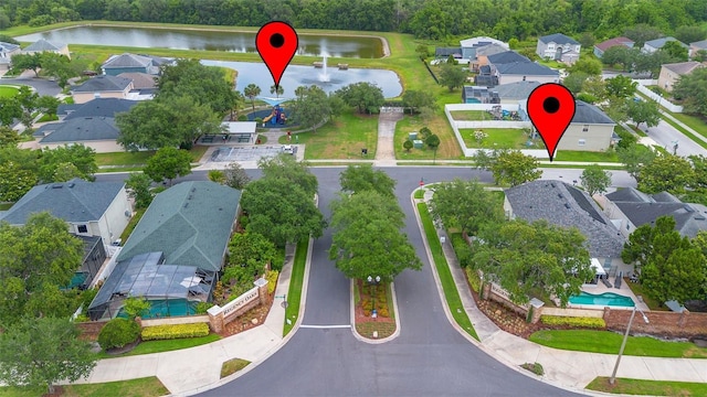 714 Home Grove Dr, Winter Garden, FL 34787 - aerial perspective of suburban area featuring a nearby body of water and a pool area