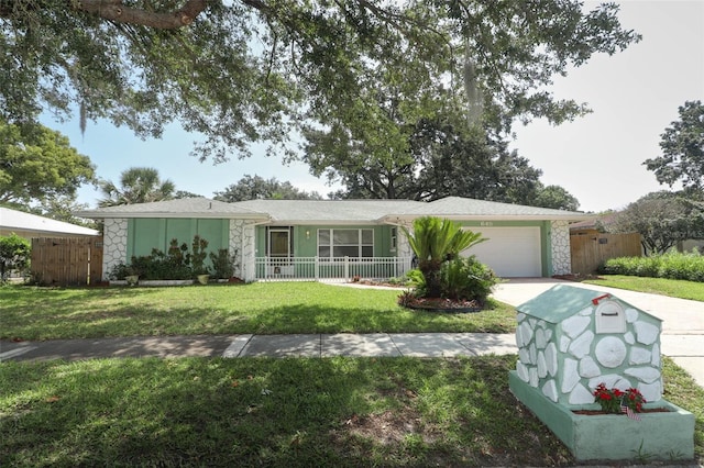 645 Peachwood Dr, Altamonte Springs, FL 32714 - ranch-style house with stone siding, an attached garage, and concrete driveway