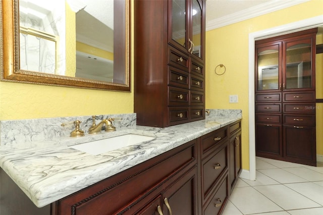645 Peachwood Dr, Altamonte Springs, FL 32714 - full bathroom featuring ornamental molding, vanity, and tile patterned floors