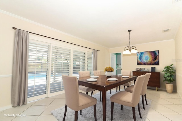 645 Peachwood Dr, Altamonte Springs, FL 32714 - dining room with light tile patterned flooring, a chandelier, and crown molding