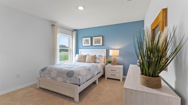 4246 Acoma Dr, Ormond Beach, FL 32174 - bedroom with light colored carpet and baseboards