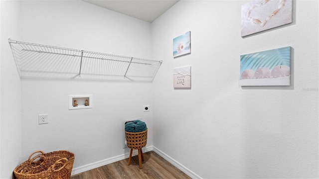 4246 Acoma Dr, Ormond Beach, FL 32174 - laundry area featuring wood finished floors, hookup for an electric dryer, baseboards, and hookup for a washing machine