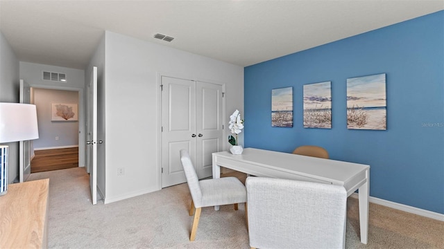 4246 Acoma Dr, Ormond Beach, FL 32174 - home office featuring light colored carpet and baseboards