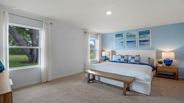 4246 Acoma Dr, Ormond Beach, FL 32174 - carpeted bedroom with baseboards