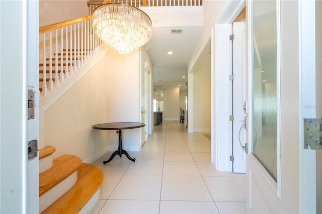 8419 Pippen Dr, Orlando, FL 32836 - tiled entryway with stairway, a chandelier, recessed lighting, and baseboards
