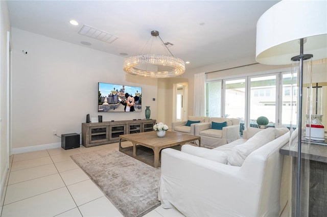 8419 Pippen Dr, Orlando, FL 32836 - living room featuring a chandelier, tile patterned flooring, baseboards, and recessed lighting