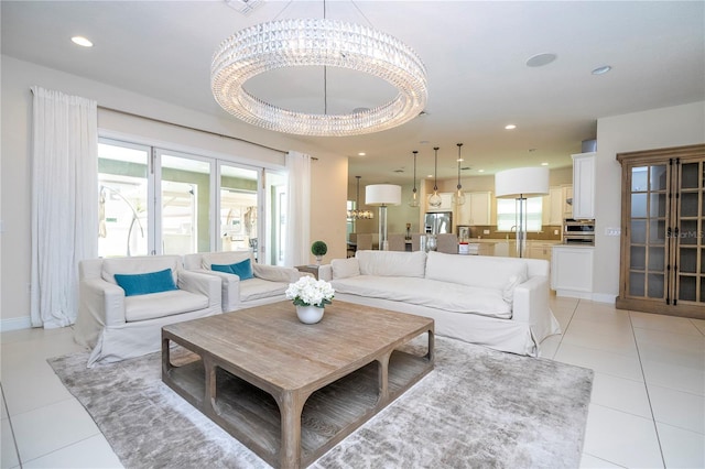 8419 Pippen Dr, Orlando, FL 32836 - living room featuring a chandelier, light tile patterned floors, and recessed lighting