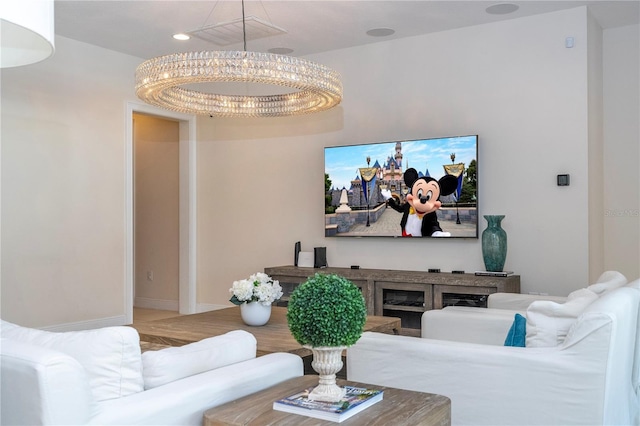8419 Pippen Dr, Orlando, FL 32836 - living area with a chandelier, baseboards, and recessed lighting