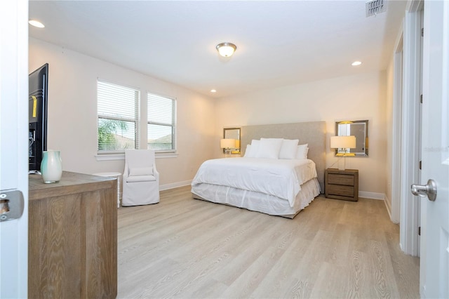 8419 Pippen Dr, Orlando, FL 32836 - bedroom with baseboards, light wood-style floors, and recessed lighting