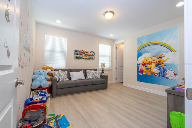 8419 Pippen Dr, Orlando, FL 32836 - living room featuring wood finished floors, recessed lighting, and baseboards