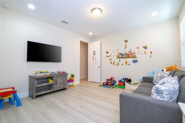 8419 Pippen Dr, Orlando, FL 32836 - rec room featuring light wood finished floors, baseboards, and recessed lighting