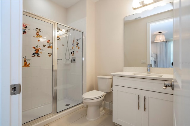 8419 Pippen Dr, Orlando, FL 32836 - full bathroom featuring a stall shower, toilet, tile patterned flooring, and vanity