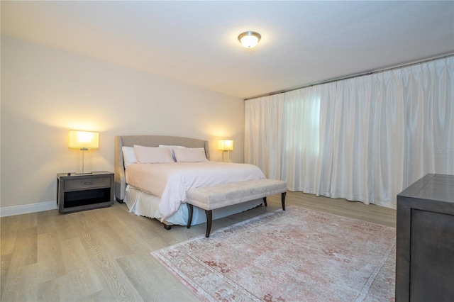 8419 Pippen Dr, Orlando, FL 32836 - bedroom with wood finished floors and baseboards