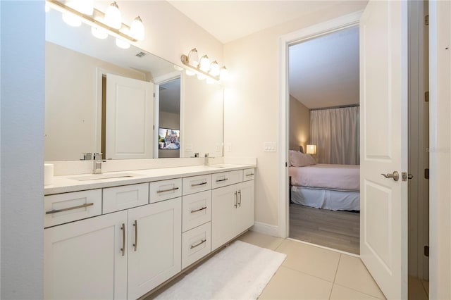 8419 Pippen Dr, Orlando, FL 32836 - ensuite bathroom featuring tile patterned flooring and double vanity