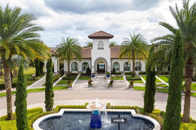 8419 Pippen Dr, Orlando, FL 32836 - back of house featuring a tile roof and stucco siding