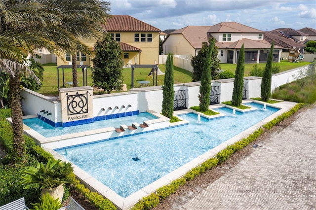 8419 Pippen Dr, Orlando, FL 32836 - view of pool featuring a residential view and a jacuzzi