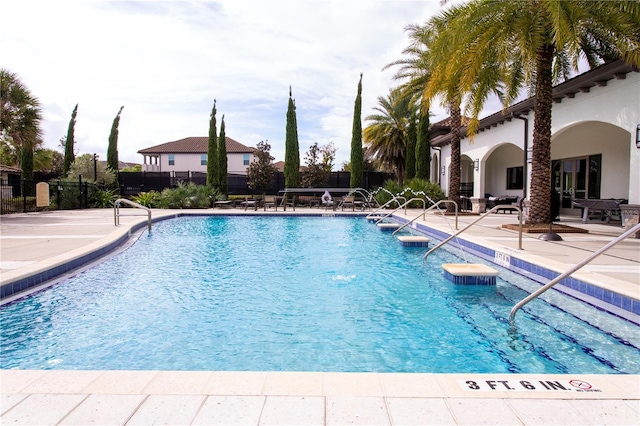 8419 Pippen Dr, Orlando, FL 32836 - community pool featuring a patio