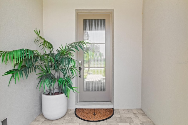 15947 Vetta Dr, Bella Collina, FL 34756 - property entrance featuring stucco siding